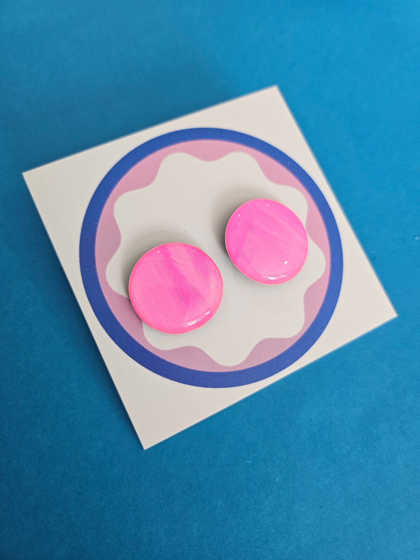 Neon pink ink studs